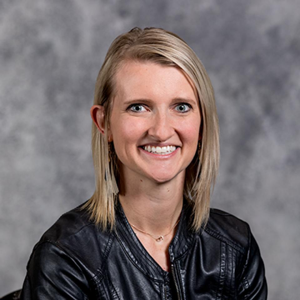 Professional headshot of Nikki Prosch