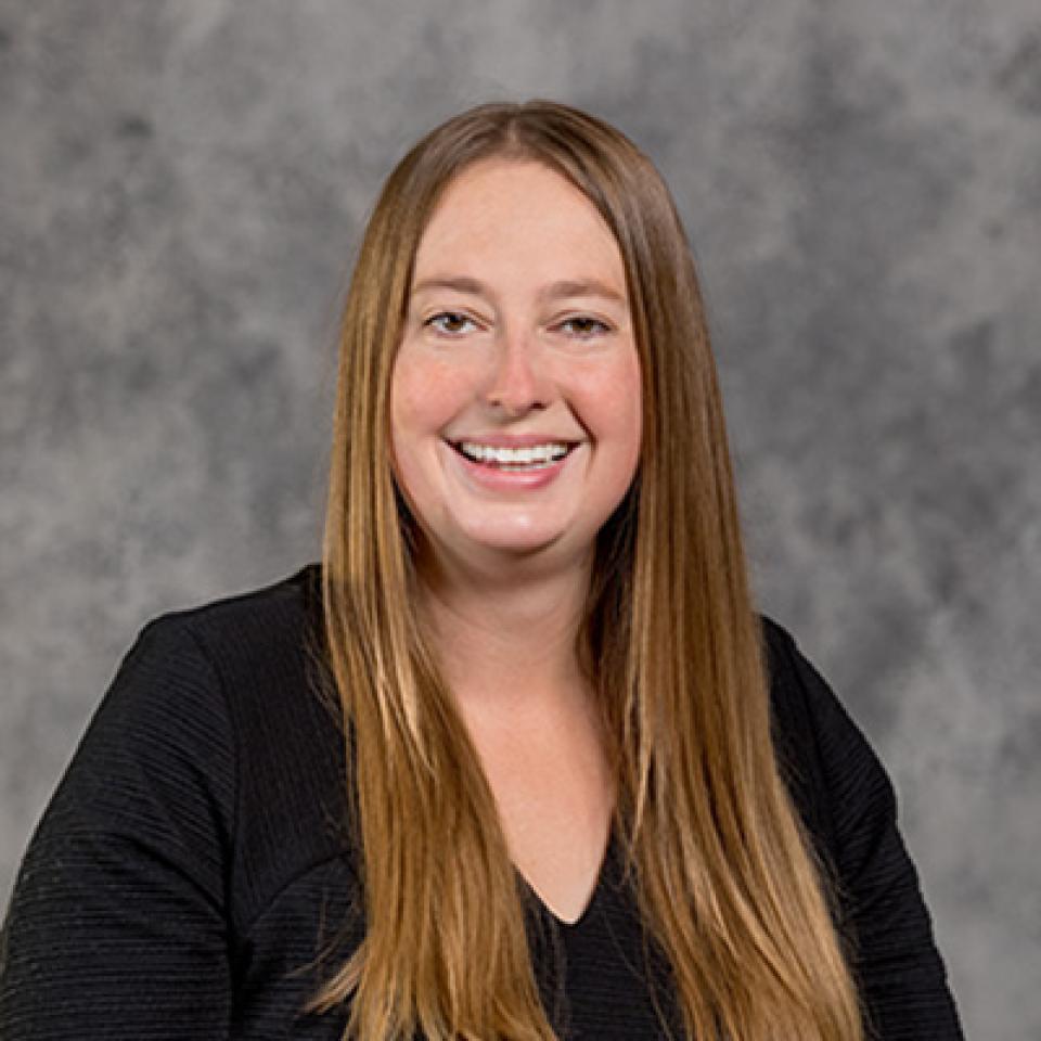 Professional headshot of Kristine Lang