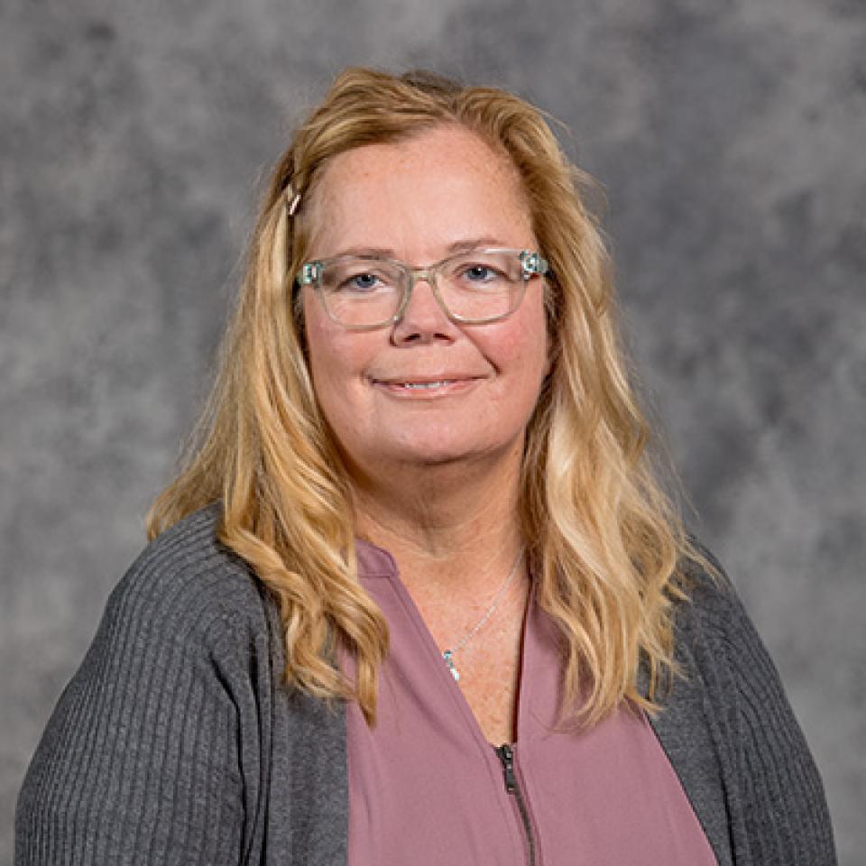 Professional headshot of Lori Oster