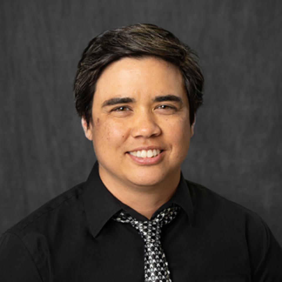 Professional portrait of Alec Murada