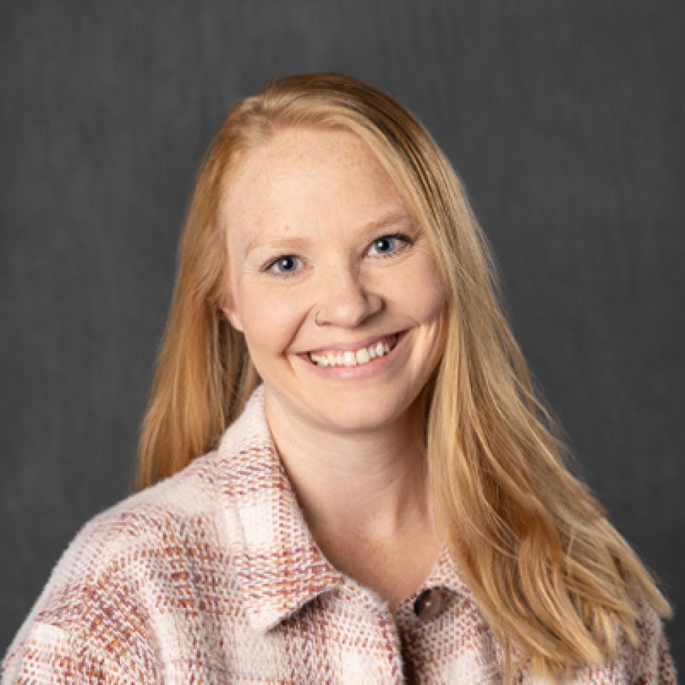 Professional portrait of Samantha DeVaney