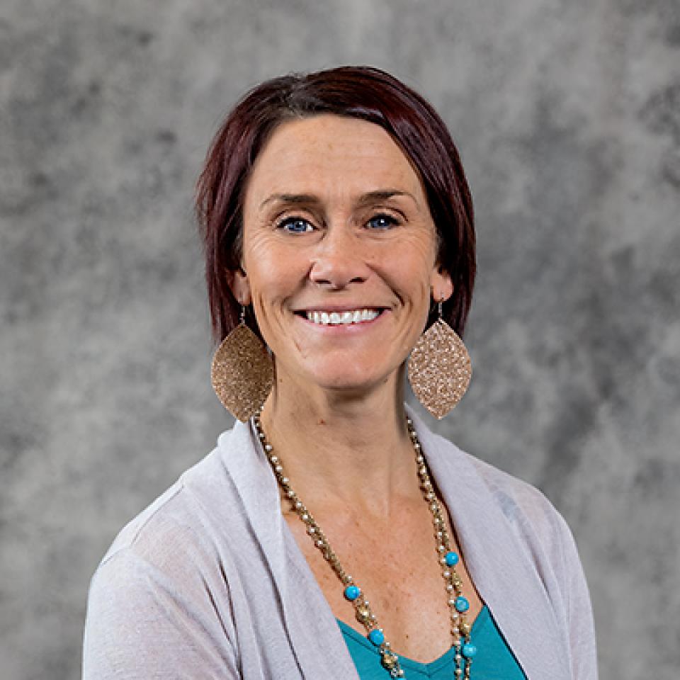 Headshot of Michelle May