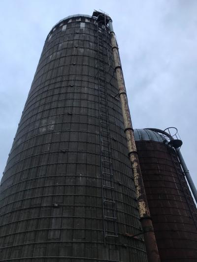 a few silos on a farm