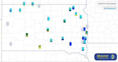 Map of South Dakota with stacks of colored circles at each weather station location, indicating soil moisture levels from orange to dark blue.