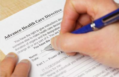 Filling in an advance health care directive form.