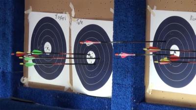 4-H archery targets with arrows in them.