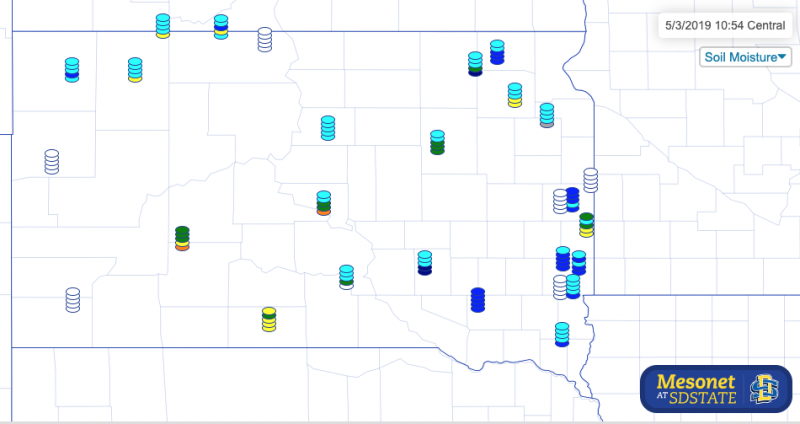 Map of South Dakota with stacks of colored circles at each weather station location, indicating soil moisture levels from orange to dark blue.