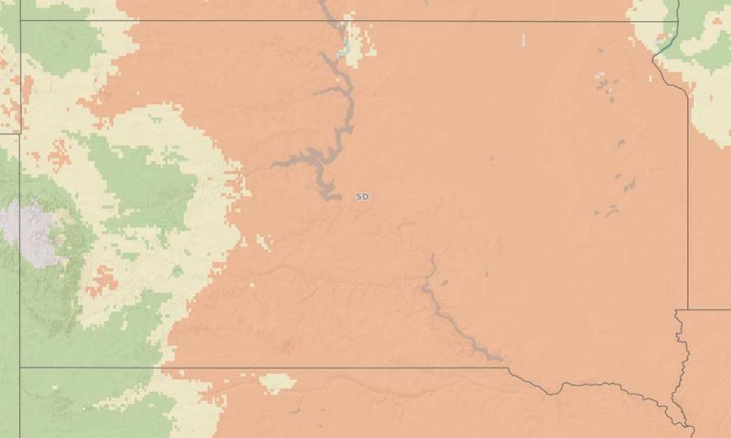 Map of the State of South Dakota showing the risk forecast of fusarium head blight. Much of the eastern 2/3rds of the state is in light red meaning high risk.