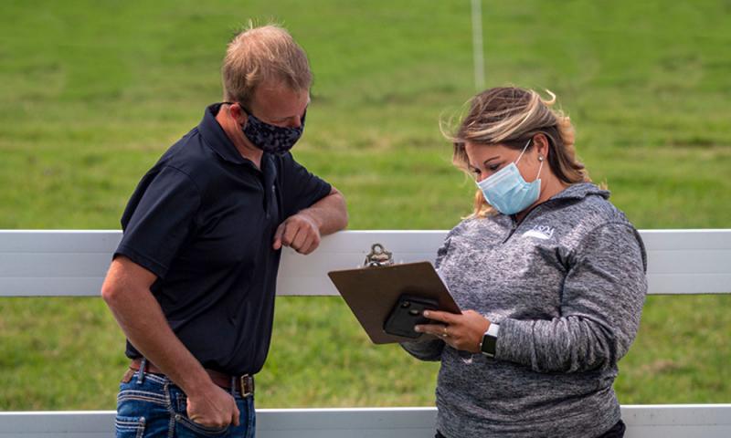 Producer and USDA agent reviewing CFAP 1.0 application.