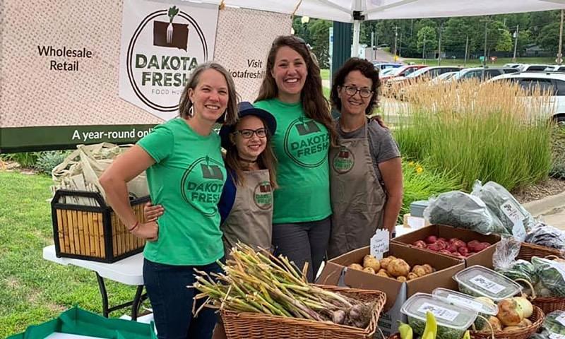 Group of team members at a Dakota Fresh booth.