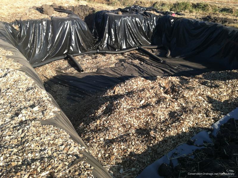 Hole in the ground with an installed bioreactor