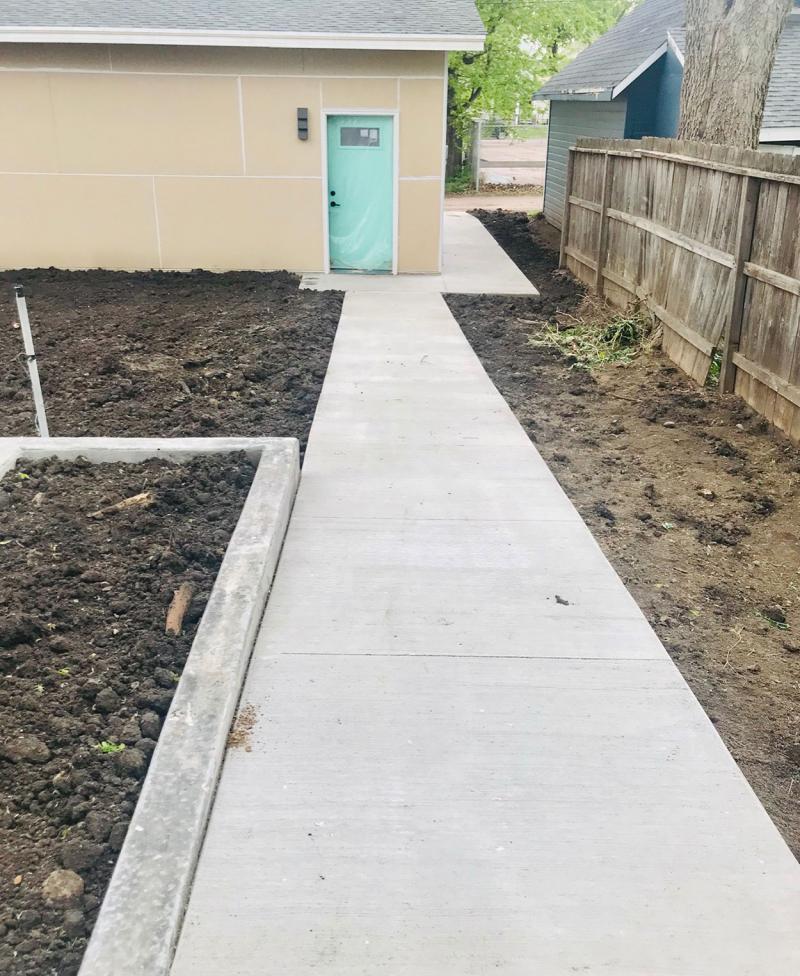 Step-less rear entrance to a modern, accessible home.