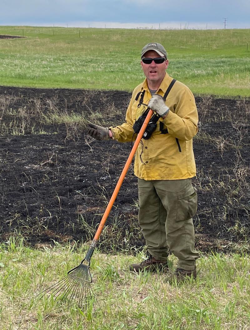 Pete Bauman speaking during a controlled burn workshop.