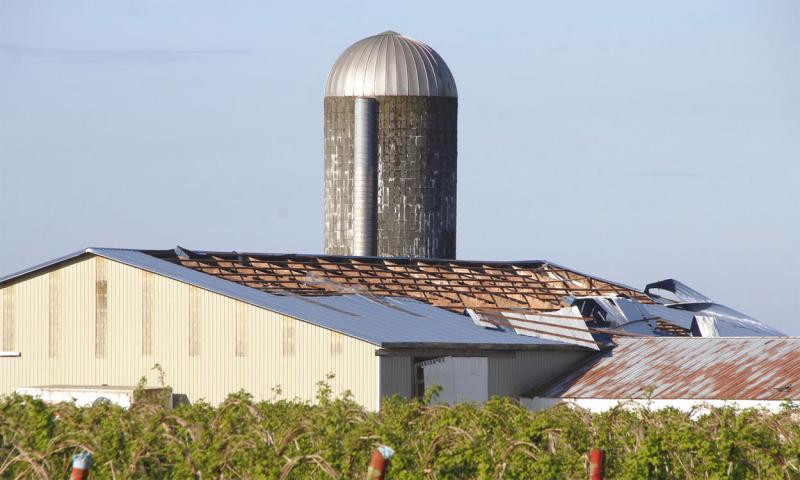 Pole barn room damaged by windstorm.