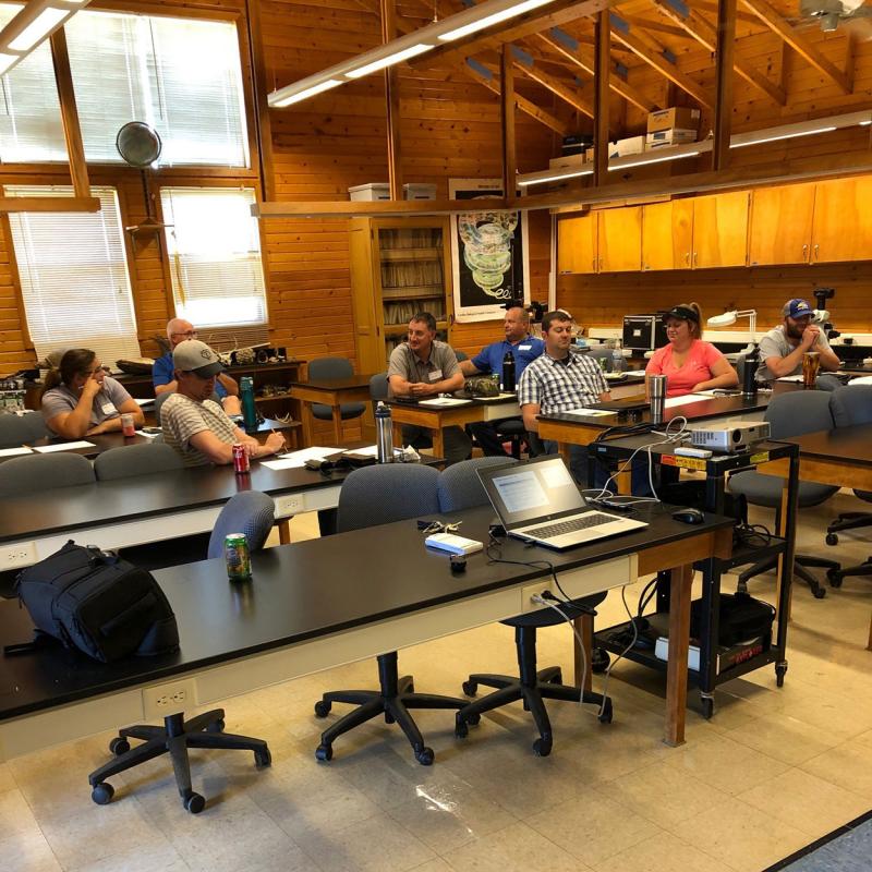 Watershed Academy attendees having group discussion.