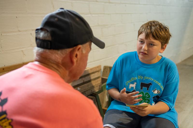 4-H youth talking to judge