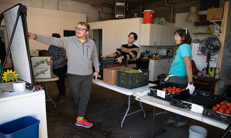 Farmers market team reviewing a food safety plan.