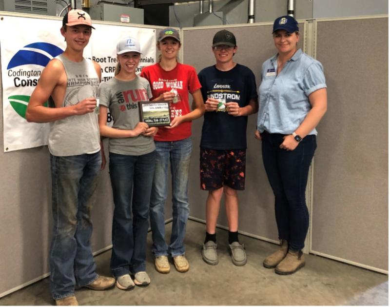 Lennox 4-H soils Judging Team poses with their award plaque