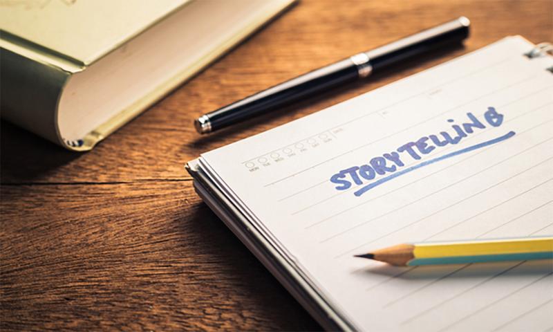 Clipboard with draft of storytelling notes.