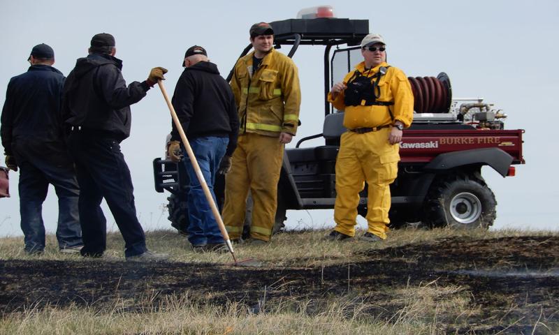 Members of the Burke County Fire Department assisting with a prescribed burn.