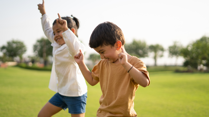 Two children dancing