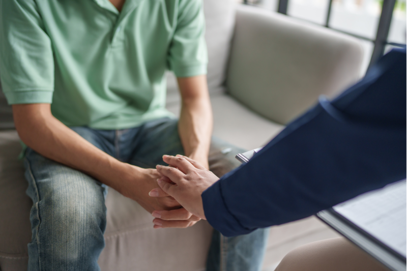 one person comforting another