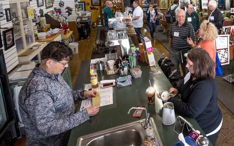 People shopping inside De Smet small business.