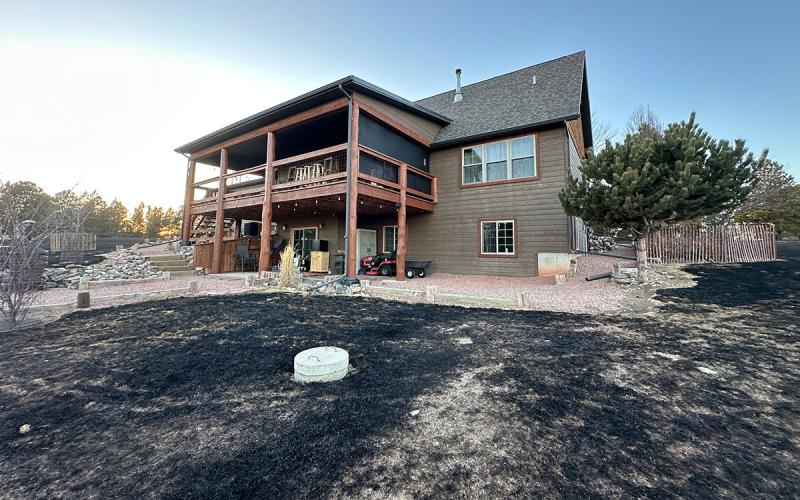 A home with ample defensible space throughout the property.