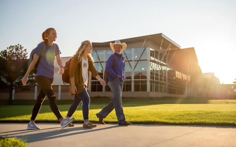 Group of young students touring the SDSU campus.