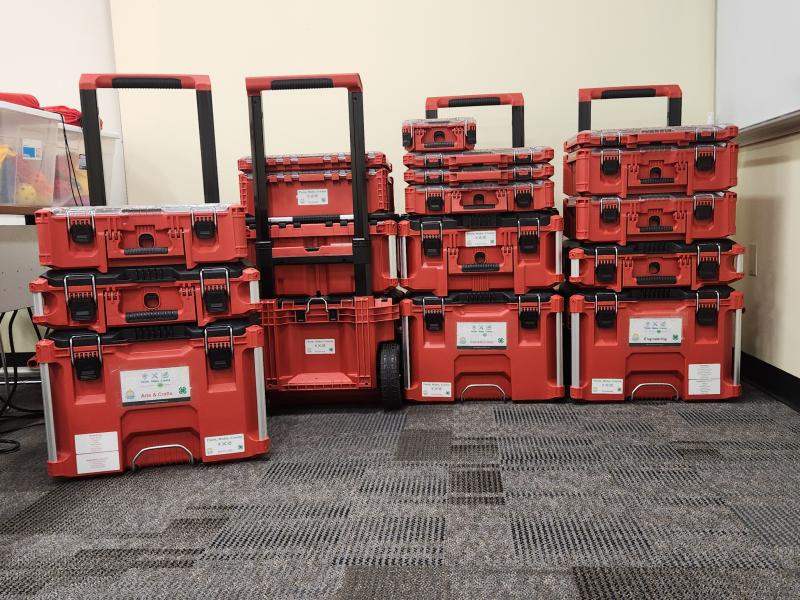 Four red Think, Make, Make, Create carts