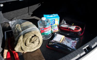 Winter emergency kit in trunk of car.