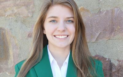 a headshot of a young woman