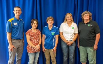 a group of honorees posing for their awards