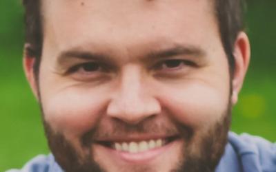 a headshot of a young man