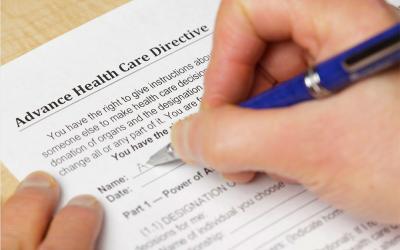 Filling in an advance health care directive form.