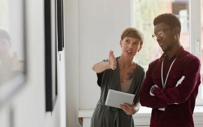Female creative director planning a space with an African American consultant.