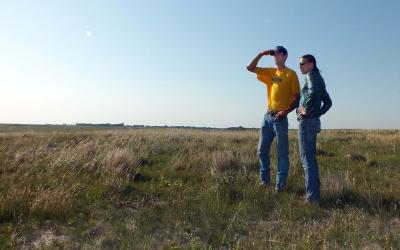Producers surveying a rangeland site.