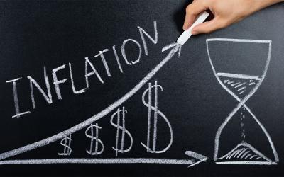 Inflation concept diagram drawn on a blackboard.