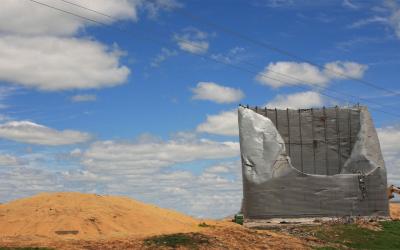 Grain bin damaged by a windstorm.