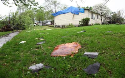 Yard and garden damaged by high winds.