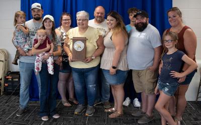 2022 4-H Volunteer Hall of Fame Awardee with family.