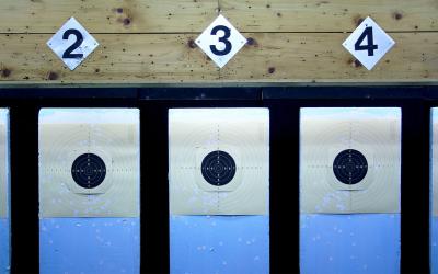 Three numbered targets in a rifle range.