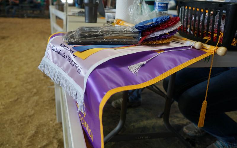 4-H banners on a table in the show ring