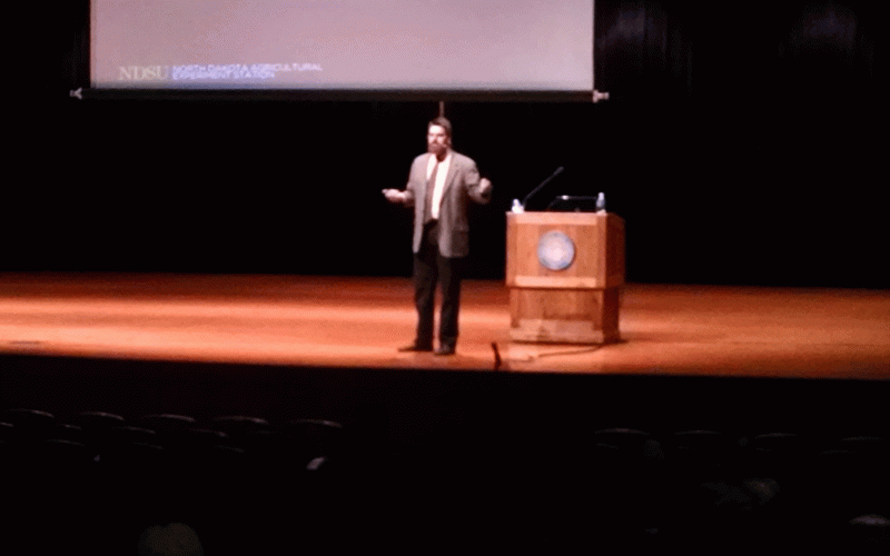 Eric Berg, professor of animal science at NDSU, giving a presentation