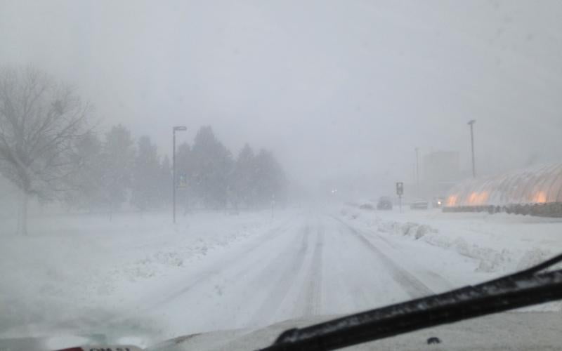 A snow-packed road leading to the SDSU Dairy Department.