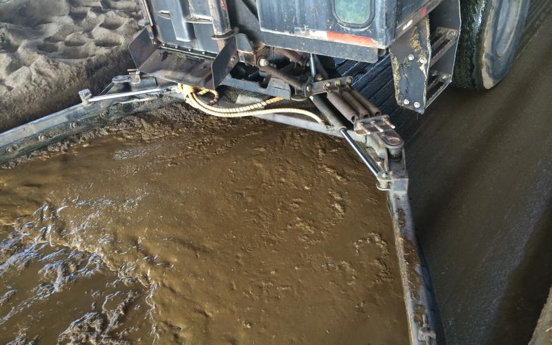 A manure pit in a dairy facility.