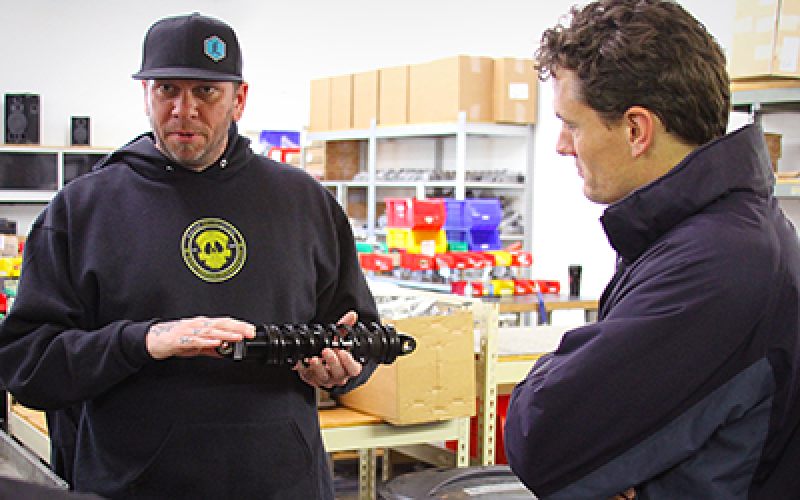 A small business owner giving a demonstration.