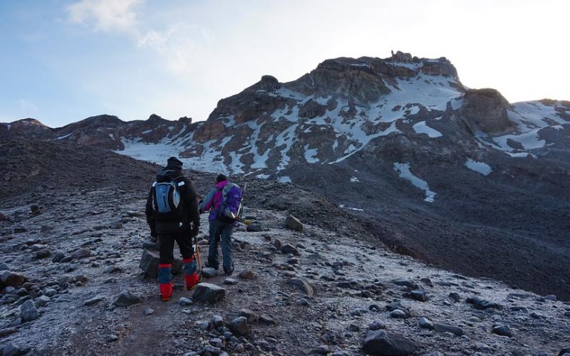 A group of mountain climbers preparing for a climb.