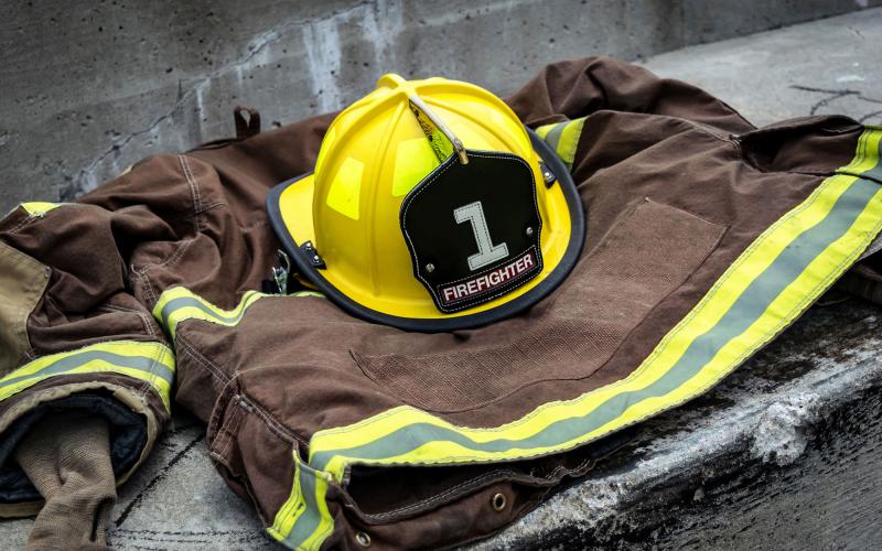 a fireman's jacket and helmet