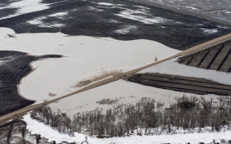 crop fields flooded by spring snow melt. USDA Photo by Lance Cheung